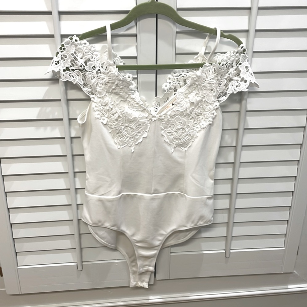 White bodysuit off the shoulder top